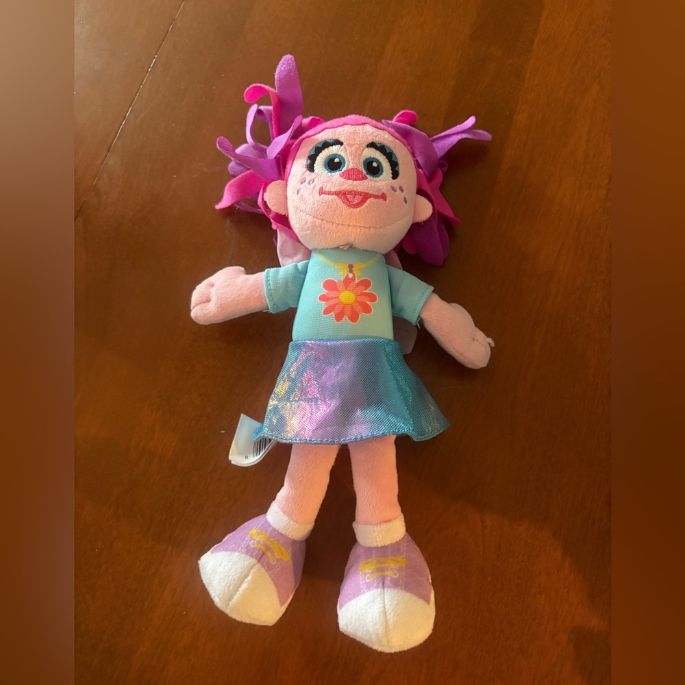 Adorable Plush Doll with Purple Hair and Blue Dress